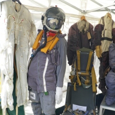 Newark Cockpit Fest 2010 High Altitude partial pressure jerkin, Taylor Type E helmet, air ventilated suit to left